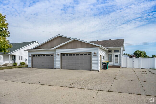 This is a typical twin home with a large cement driveway area in Arbor Glen.