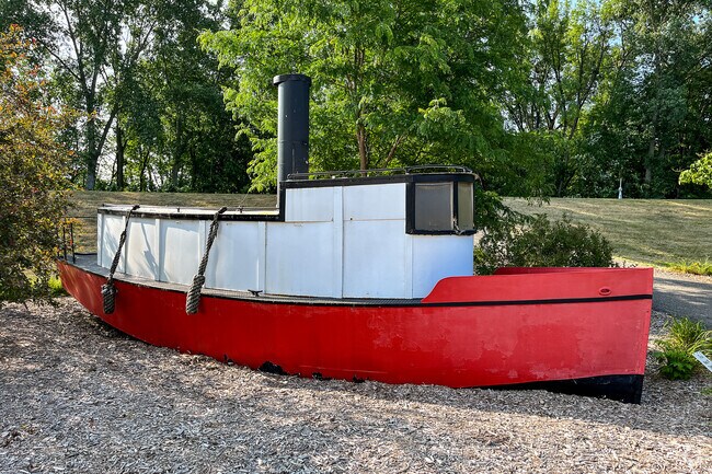 A tugboat display in downtown Carver signifies the change from waterway transportation to rail.