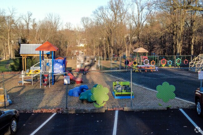 There is a playground at the Neshaminy Valley Montessori School for the children to play.