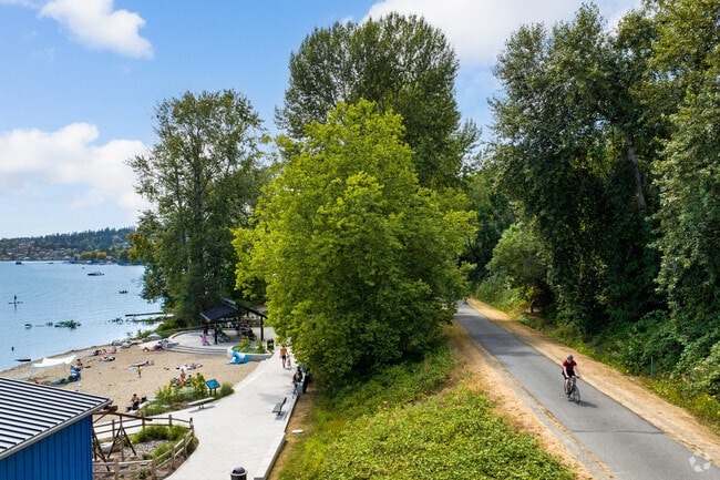 Relax on the beach at Log Boom Park after a bike ride on Burke-Gilman Trail in Sheridan Beach.