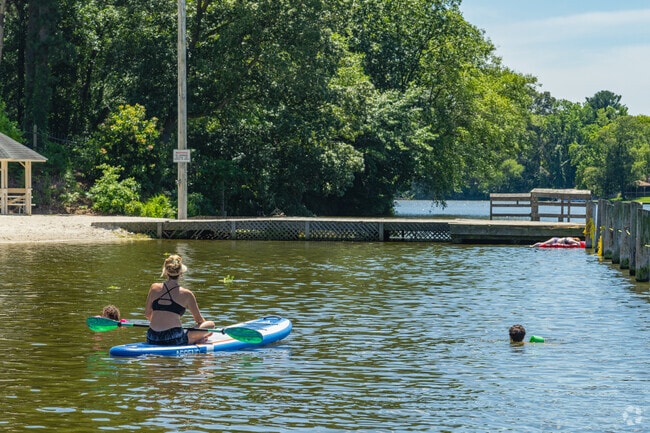 Local paddle boarders love to spend the afternoon at Lake Como Town Park.