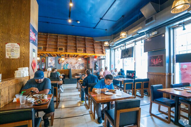 Locals love the delicious dumplings served at Hunan Cuisine in Chinatown.