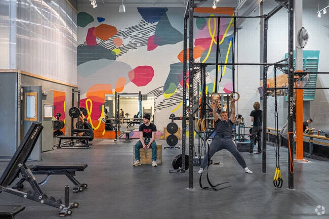 Bouldering Project includes a full gym and weight room alongside climbing and yoga.