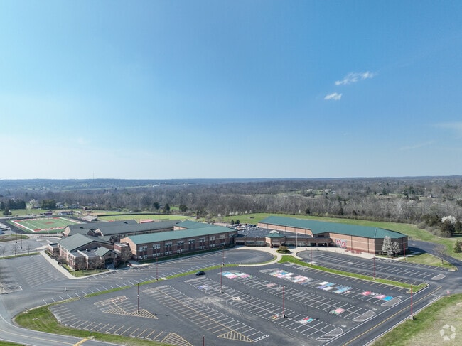 There are many neighborhoods that are close to the school.