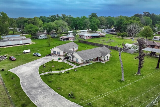 Homes on large acres of land can be found in New Caney.