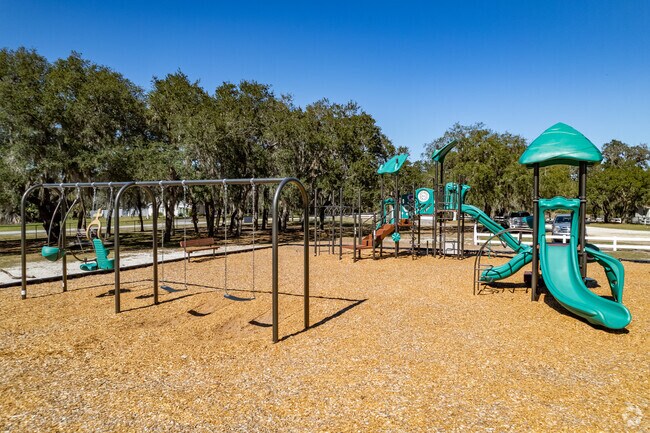 Loughman Park playground includes swings and slides for kids.