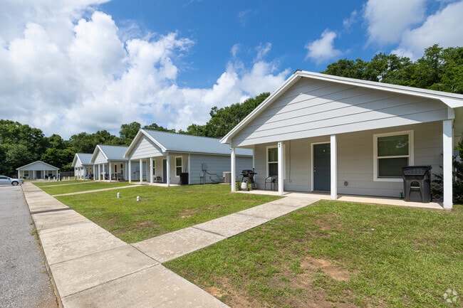 A row of small cottages nestled in Bayou La Batre, AL.