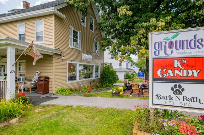 Two friends catch up over some coffee at Grounds in New London.