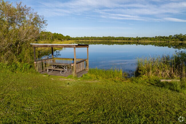 Royal Oaks- Dock overlooking Scenic view over lake in  George LeStrange Park