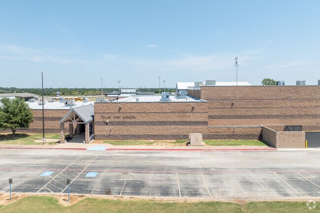 The clean lines of Tolar High School’s campus reflect a focus on education and community pride.