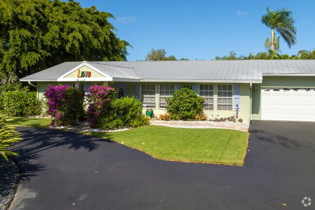 Colorful mid century ranch homes with manicured landscaping are common here.