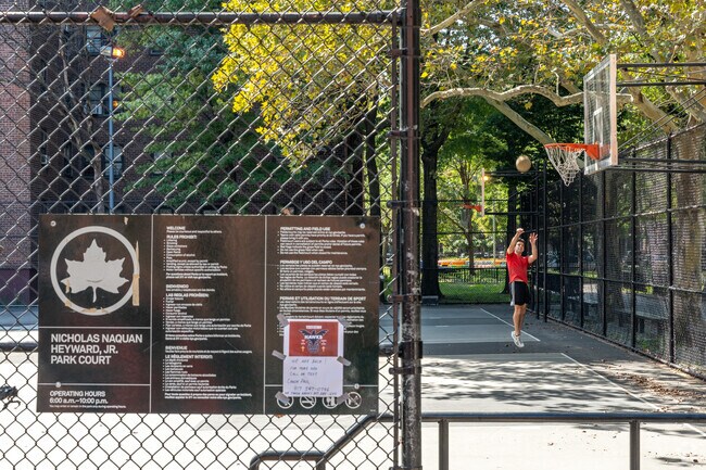 Play a couple games of basketball at Nicholas Naquan Heyward Jr. Park.