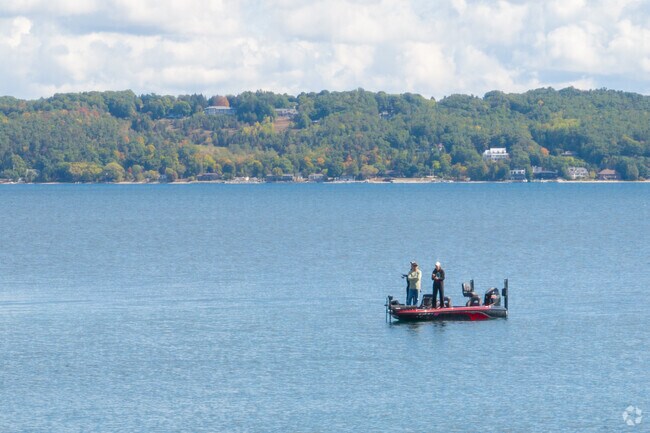 Greilickville locals and visitors alike head out on Grand Traverse Bay for serene fishing.