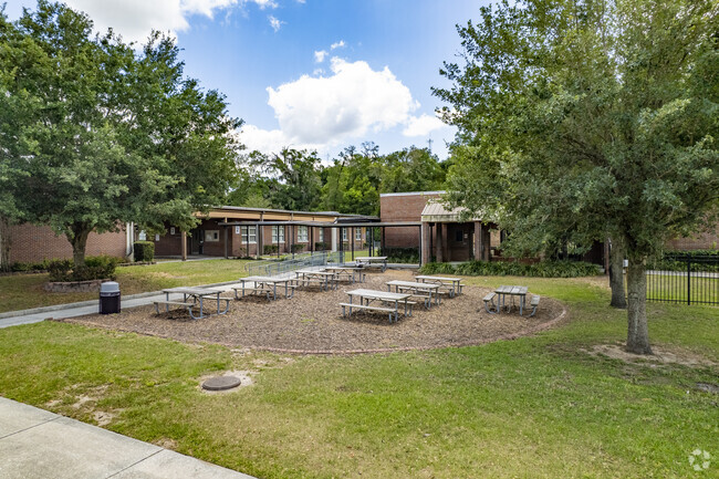 There are plenty of outdoor picnic tables for students and teachers of Yates Elementary to use.
