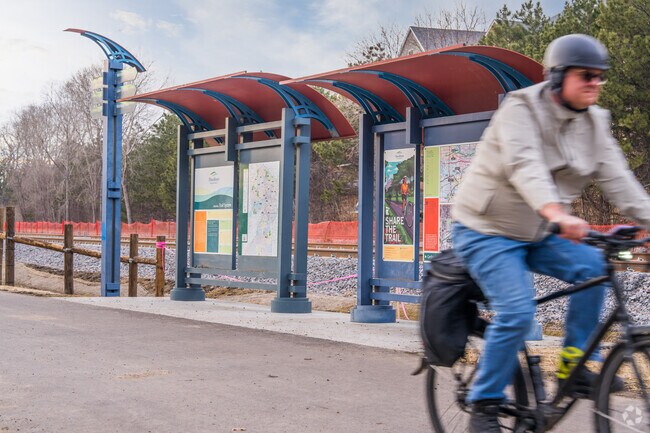 A cyclist making their way on the greenway that leads to Minneapolis.