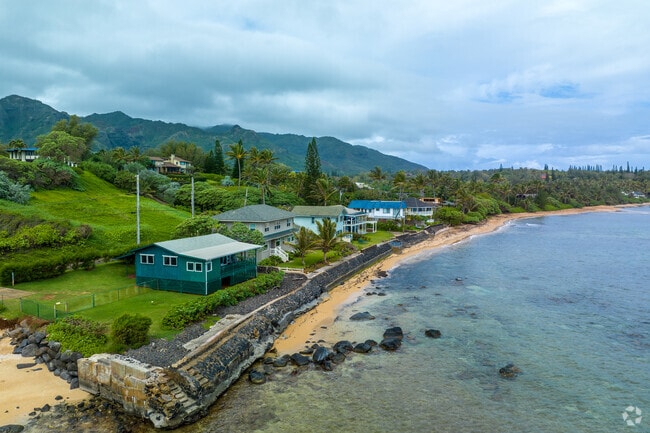 Farm-style beach front homes are found on Anahola Bay.