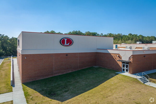 Low altitude view of the logo at the front of the school