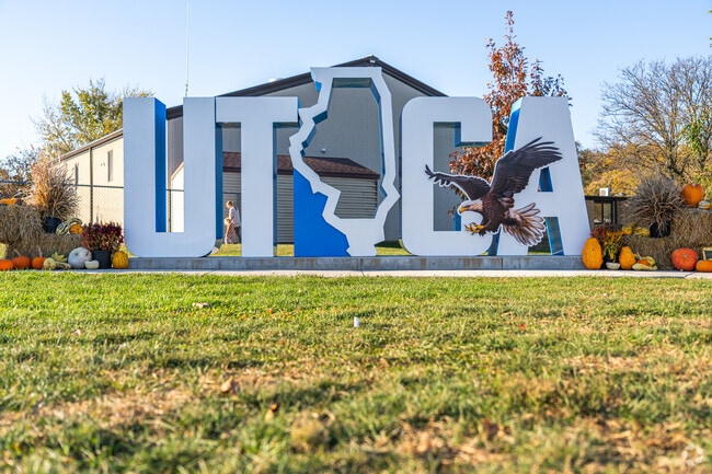 A welcoming “UTICA” sign greets visitors and residents alike, celebrating the North Utica's pride, local spirit, and scenic location in the heart of Illinois.