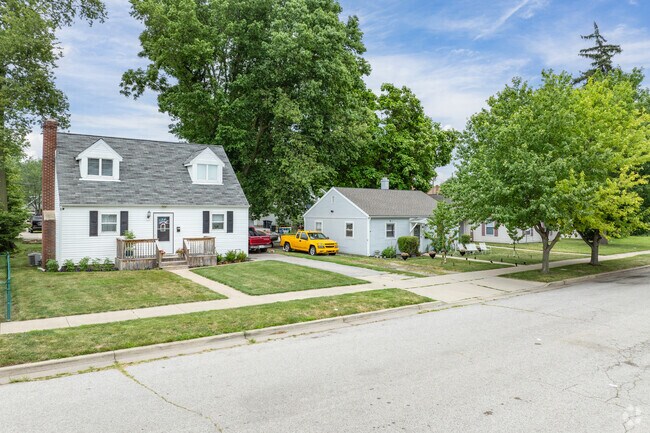 Minimal Traditional homes with front and back yards can be seen in Hanna, Lafayette, Indiana.