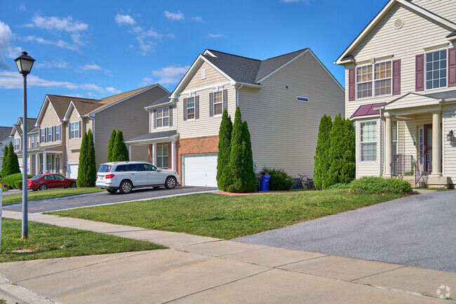 Modern two story single family homes are one housing option in Collegiate Acres.
