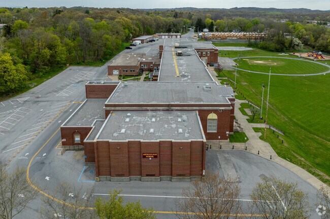 Arthur S May Elementary School serves students in the Arlington community.