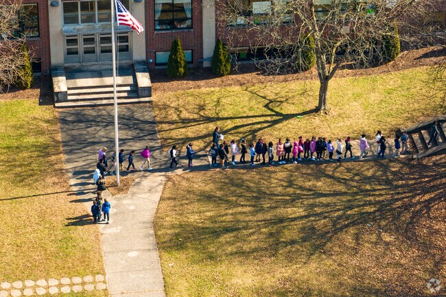 Kids line up to go back inside at Academy of Science & Citizenship Charter School in Southside.