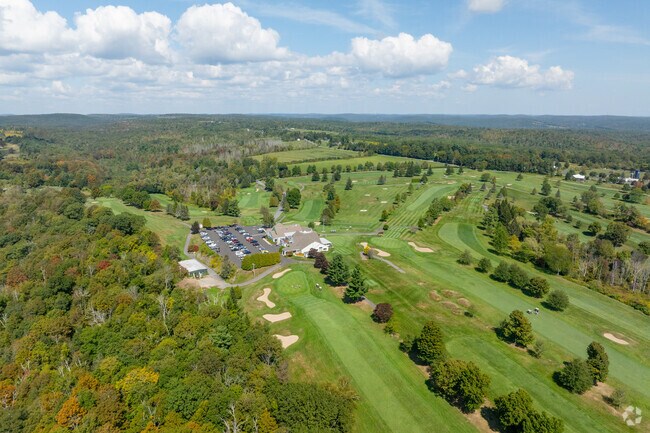 Torrington Country Club features a dining room, 18-hole course, and hosts social events.