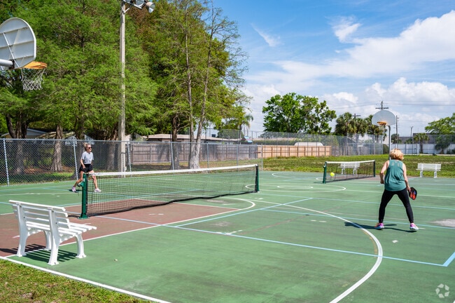 Residents enjoy Foster Park for recreation and a playground for kids.