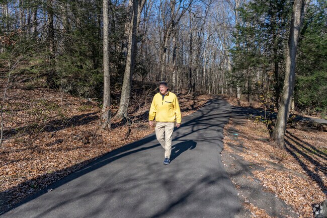 Locals enjoy the Mattituck Trail for walking, biking, and running all year long in Wolcott.