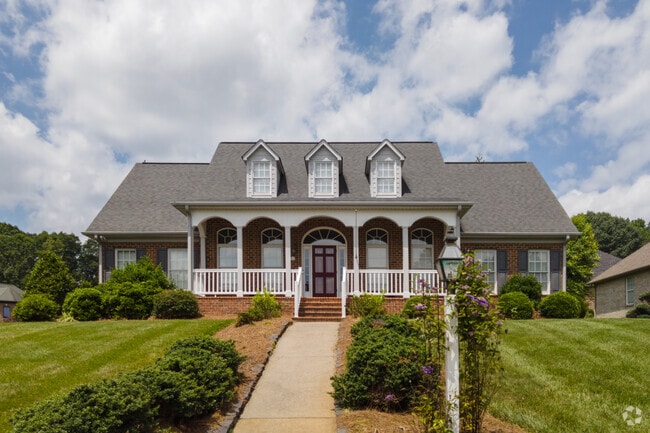 Dutch Colonial style homes on Tredegar Rd in Abbotts Creek.