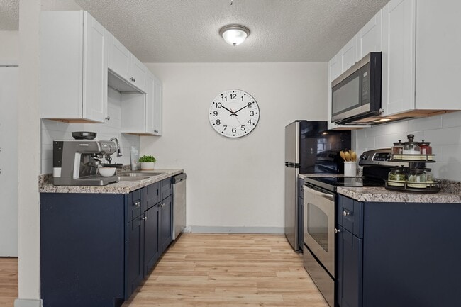 Olympic Square - Gorgeous Renovated Apartments, Colorado Springs, CO 80909 - photo 6
