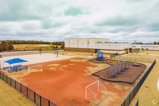 Charter Oak Elementary offer a playground and sports field for children.
