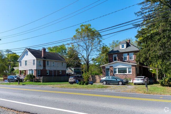 Tree-lined streets in Martinsville showcase a mix of home styles.