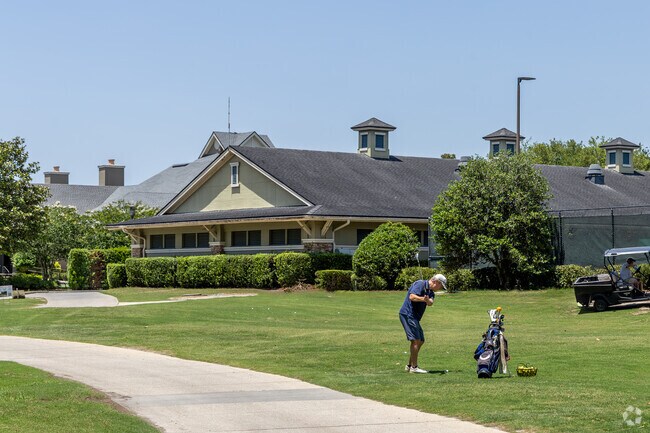 Practice your swing at Saint Johns Golf and Country Club.