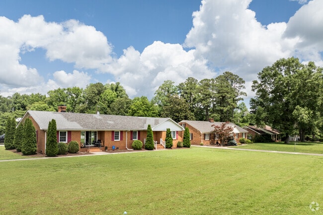 A row of ranch-style houses showcases the suburban landscape of Franklin, Virginia.