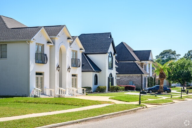 Estate homes in Spring Valley feature mini-roundabouts at the front.