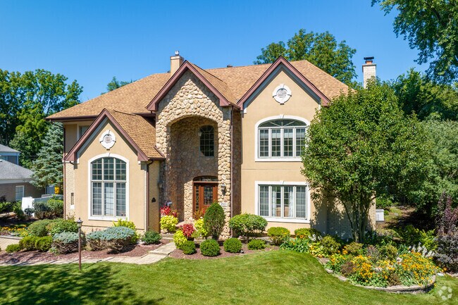 Huge custom built modern homes sit on oversized lots near the country club in Flossmoor.