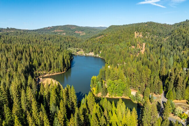 White Pines Lake draws summer visitors for fishing and paddle boating.
