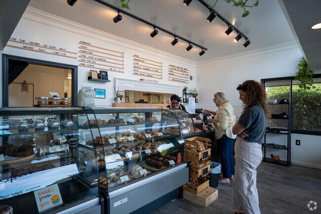 Joyfully savoring freshly baked delights at Neces Gf Bakery.