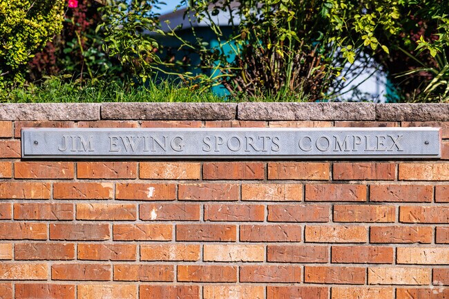 Signs dedicate the Ewing Sports Complex to the memory of local citizen Jim Ewing.