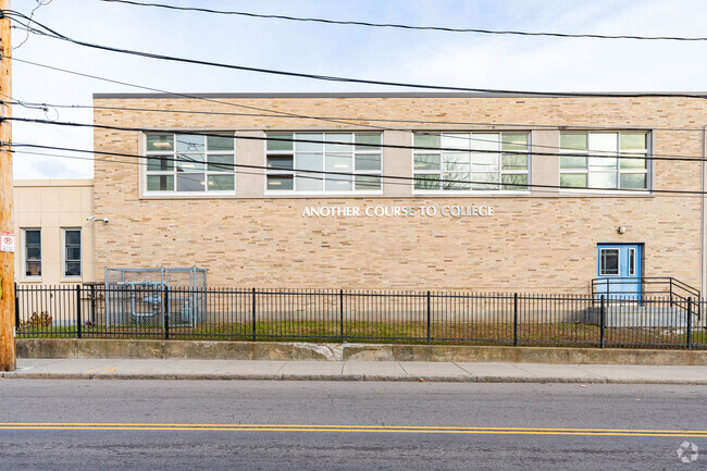 Another Course to College serves grades 9-12 in Hyde Park, MA.