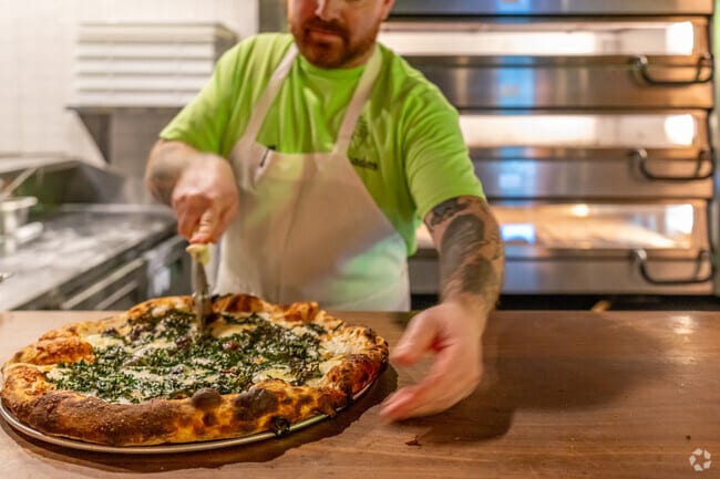 Try the savory Golden Green at Decades Pizza