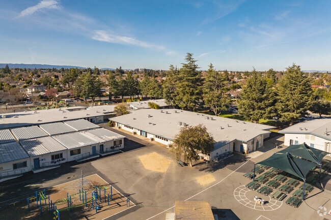 Ponderosa Elementary School offers a large playground and baseball field for students to play.