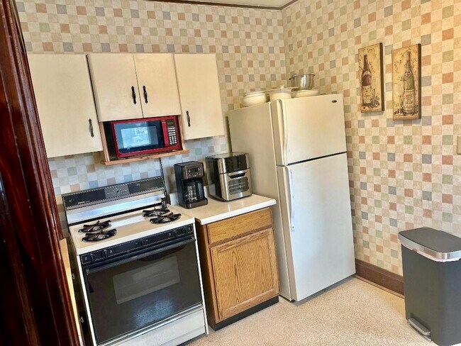 Kitchen includes pots, pans, dishes etc.