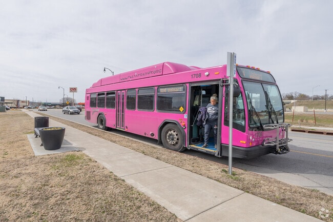 Tulsa Transit operates multiple stops in Sand Springs, just across the Arkansas River.
