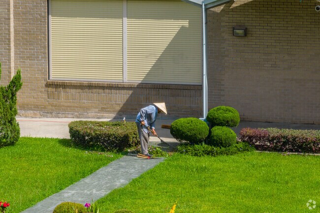 Gardens flourish around Mary Queen of Vietnam Church in Village de l’Est.
