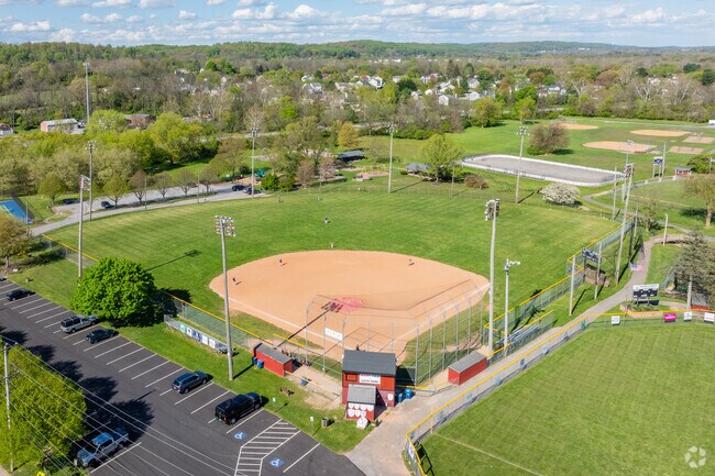 Caln Municipal Park hosts baseball, softball and tee ball games surrounding a playground.