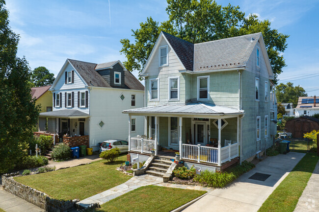 Among the many home types in Hamilton, you'll find Victorians with large front porches.