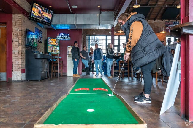 Compete with friends during the Groundhog Open putt-putt tournament hosted by Sun Prairie bars.