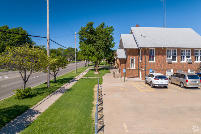 A sidewalks runs by Peterson Elementary School.
